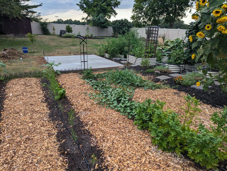 garden with empty concrete pad