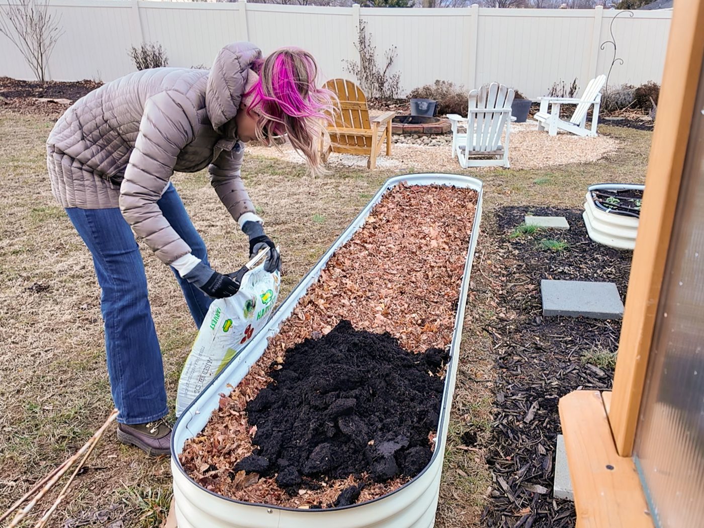 filling a raised bed with soil
